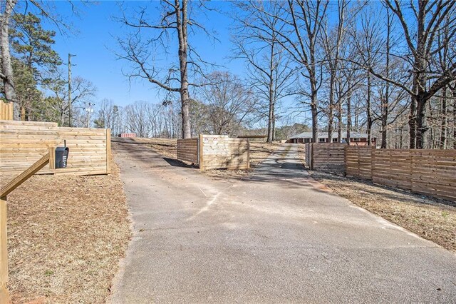 view of street with aphalt driveway