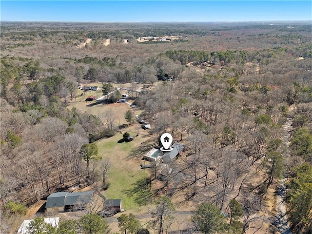 aerial view with a wooded view