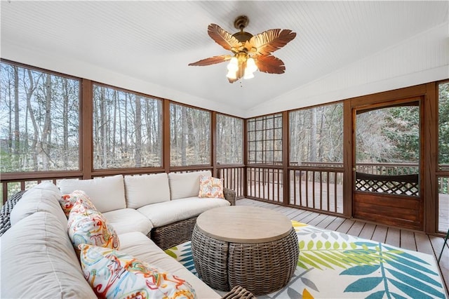 sunroom / solarium featuring vaulted ceiling and ceiling fan