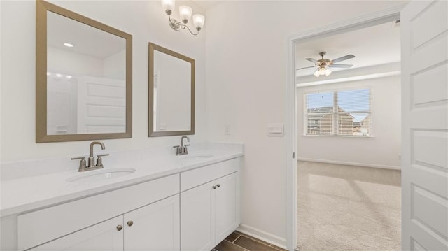 bathroom featuring vanity and ceiling fan