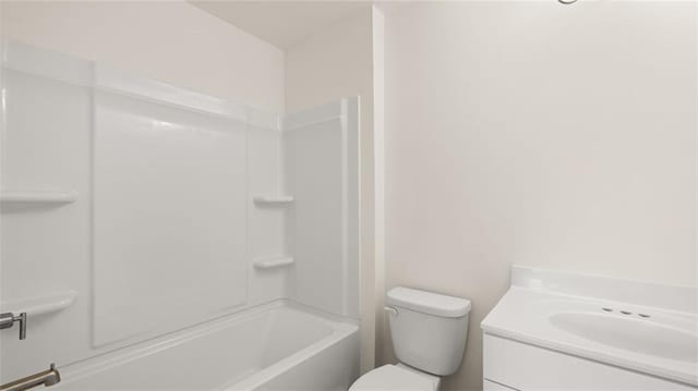 full bathroom with vanity,  shower combination, and toilet