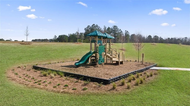 view of playground featuring a lawn