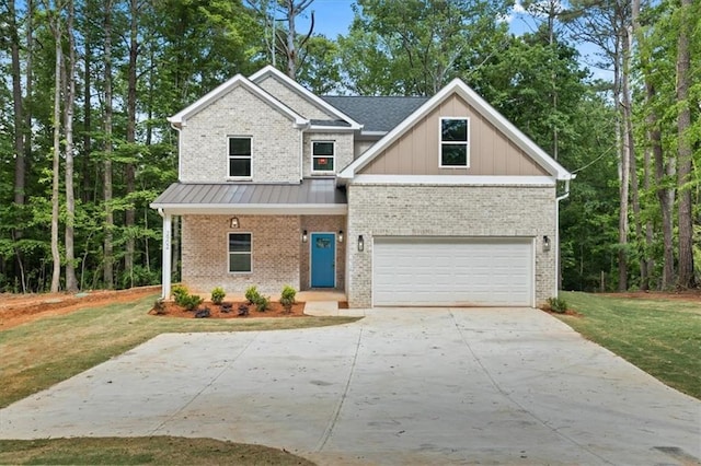 3902 Bouldercrest Rd SE, Ellenwood, GA 30294 - craftsman inspired home featuring concrete driveway, brick siding, an attached garage, and a front yard