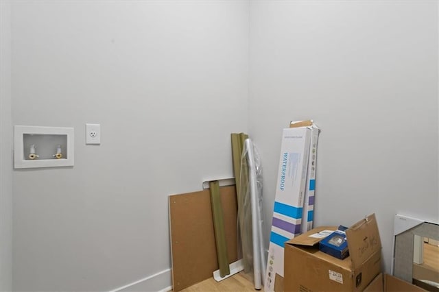 3902 Bouldercrest Rd SE, Ellenwood, GA 30294 - washroom featuring hookup for a washing machine, laundry area, and wood finished floors