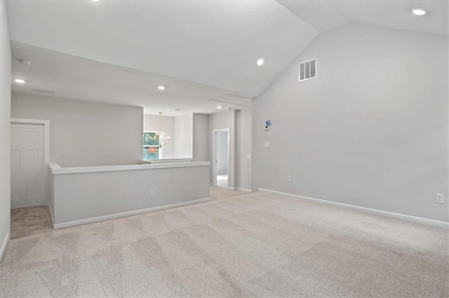 3902 Bouldercrest Rd SE, Ellenwood, GA 30294 - empty room with lofted ceiling, recessed lighting, visible vents, a chandelier, and carpet floors