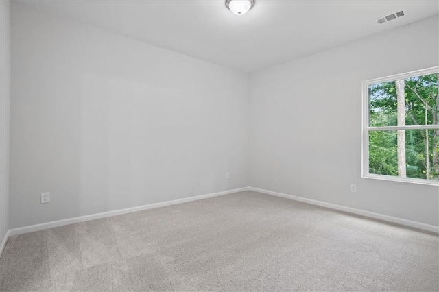 3902 Bouldercrest Rd SE, Ellenwood, GA 30294 - unfurnished room featuring carpet, visible vents, and baseboards