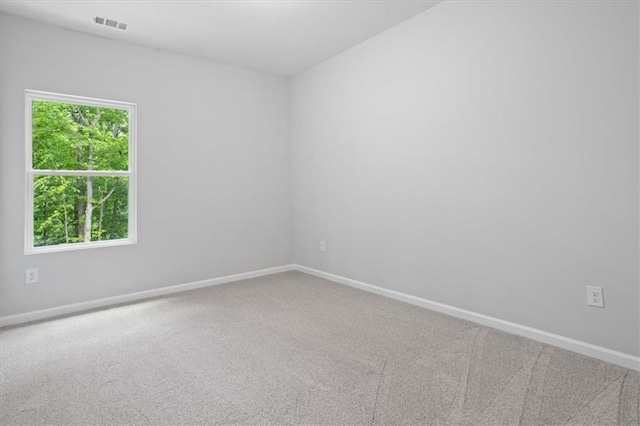 3902 Bouldercrest Rd SE, Ellenwood, GA 30294 - unfurnished room with carpet, baseboards, and visible vents