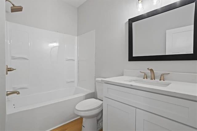 3902 Bouldercrest Rd SE, Ellenwood, GA 30294 - full bath with toilet, vanity, shower / bathing tub combination, and wood finished floors
