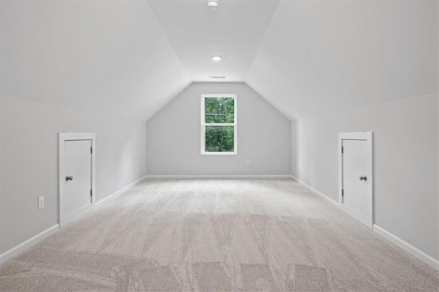 3902 Bouldercrest Rd SE, Ellenwood, GA 30294 - additional living space with carpet, baseboards, and lofted ceiling