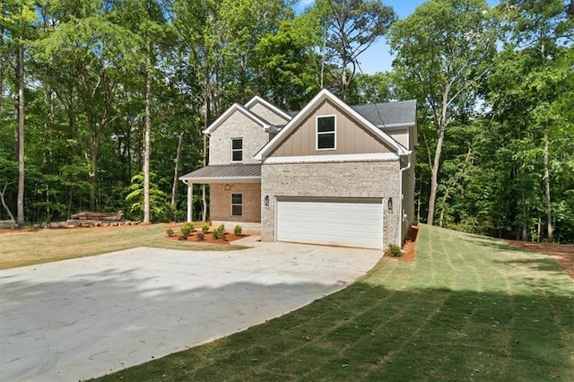 3902 Bouldercrest Rd SE, Ellenwood, GA 30294 - view of property exterior with a yard, driveway, brick siding, and a garage