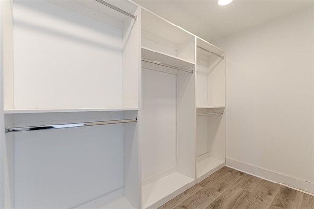 668 Liella Park SE, Atlanta, GA 30312 - walk in closet featuring light wood-type flooring