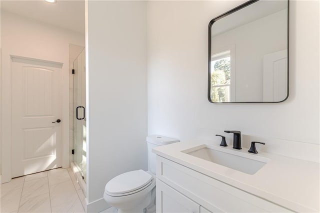 668 Liella Park SE, Atlanta, GA 30312 - bathroom featuring vanity, toilet, and walk in shower