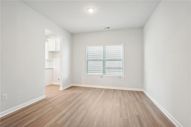 350 Lanier Cir, Woodstock, GA 30189 - unfurnished room featuring light wood finished floors and baseboards