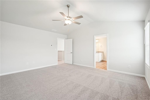 350 Lanier Cir, Woodstock, GA 30189 - unfurnished bedroom with light colored carpet, lofted ceiling, a ceiling fan, and ensuite bathroom