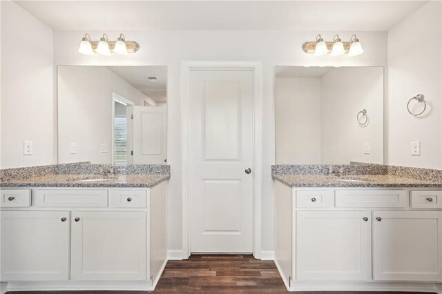 350 Lanier Cir, Woodstock, GA 30189 - full bath featuring wood finished floors and two vanities