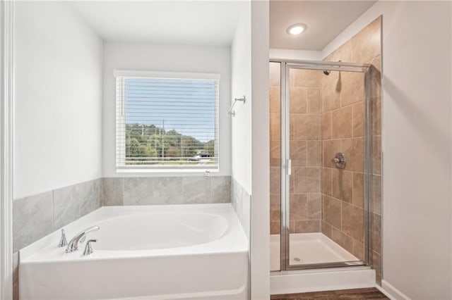 350 Lanier Cir, Woodstock, GA 30189 - bathroom with a bath and a stall shower