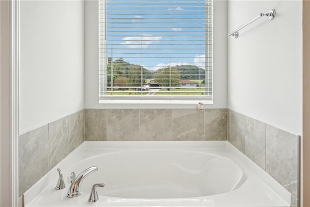 350 Lanier Cir, Woodstock, GA 30189 - full bathroom featuring healthy amount of natural light and a bath