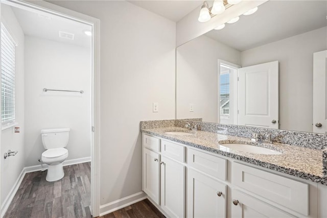 350 Lanier Cir, Woodstock, GA 30189 - bathroom featuring wood finished floors and double vanity