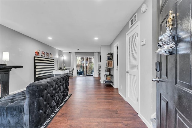 living room with dark hardwood / wood-style floors