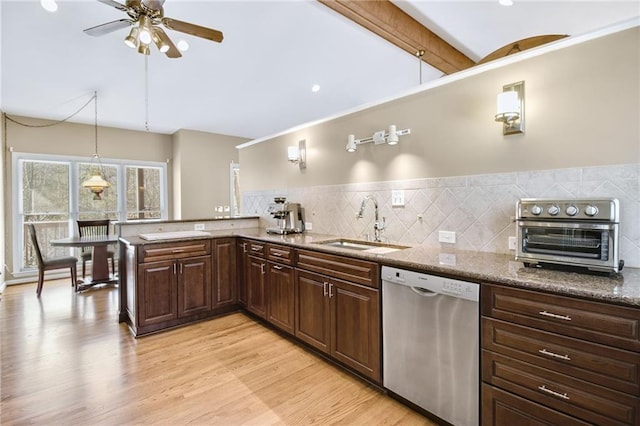 71 Yellow Root Dr, Big Canoe, GA 30143 - kitchen featuring stainless steel dishwasher, a sink, ceiling fan, a peninsula, and light wood finished floors