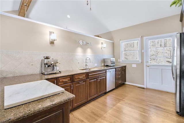 71 Yellow Root Dr, Big Canoe, GA 30143 - kitchen with a sink, white dishwasher, freestanding refrigerator, backsplash, and light wood-style floors