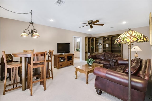71 Yellow Root Dr, Big Canoe, GA 30143 - living area with light carpet, a ceiling fan, a chandelier, and recessed lighting