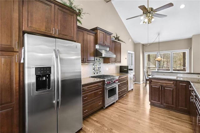 71 Yellow Root Dr, Big Canoe, GA 30143 - kitchen featuring stainless steel appliances, under cabinet range hood, ceiling fan, light wood-type flooring, and tasteful backsplash