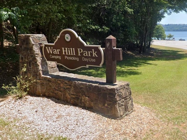 3363 War Hill Park Rd, Dawsonville, GA 30534 - community sign featuring a yard and a water view
