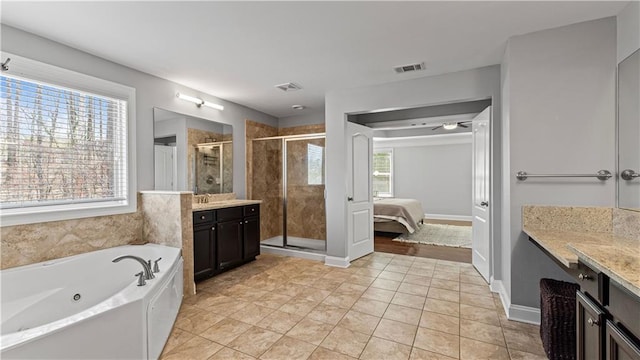 full bath featuring visible vents, a shower stall, vanity, and a tub with jets