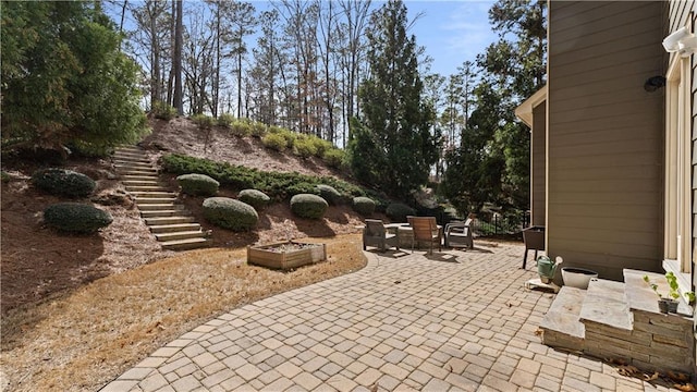 view of patio / terrace featuring stairway and outdoor dining area