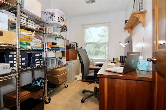 home office featuring carpet flooring and visible vents