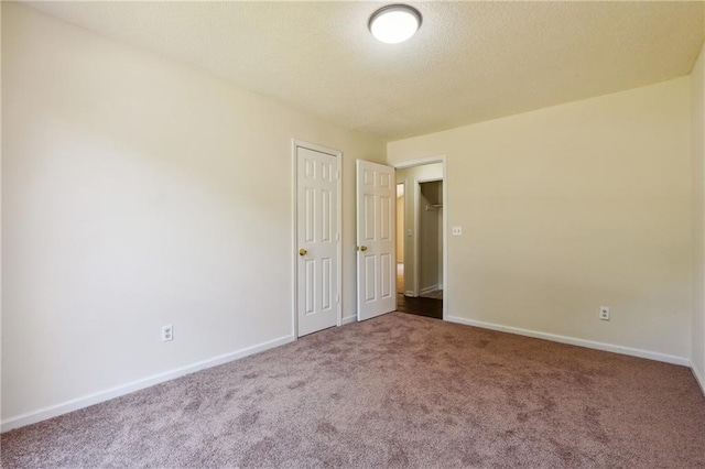 6445 Marsham Dr, Atlanta, GA 30349 - carpeted spare room featuring baseboards