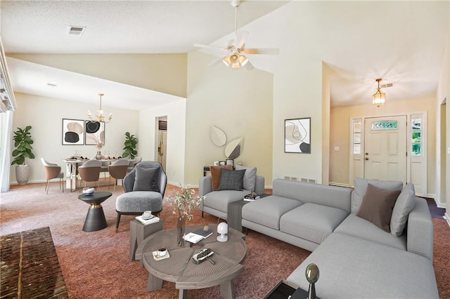 6445 Marsham Dr, Atlanta, GA 30349 - living area with vaulted ceiling, carpet flooring, a chandelier, ceiling fan, and baseboards