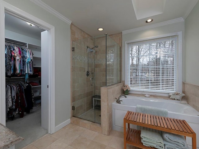 bathroom with tile patterned floors, ornamental molding, and independent shower and bath