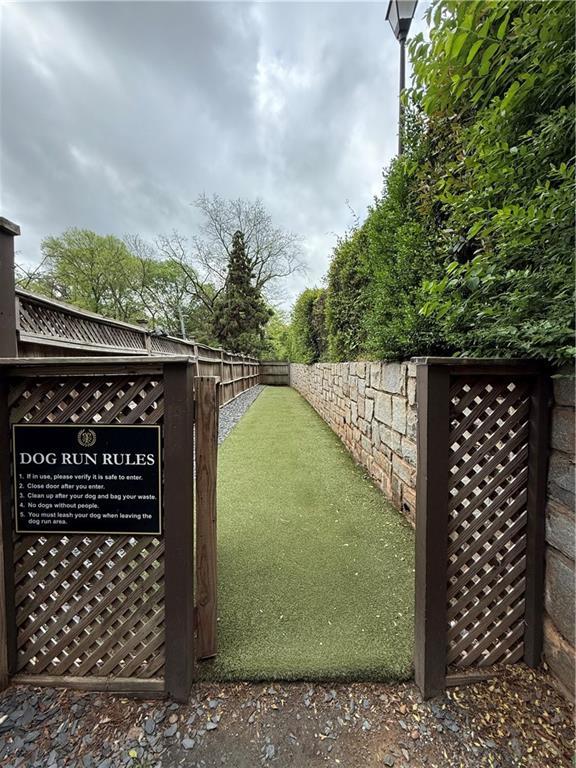 955 Juniper St Unit 3026, Atlanta, GA 30309 - view of gate with fence