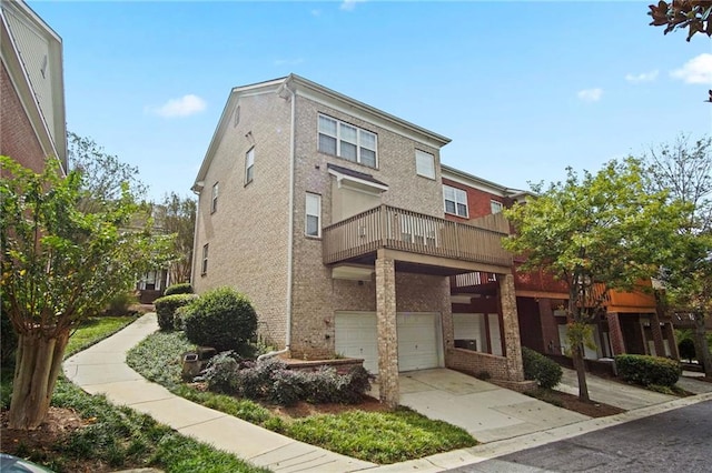 exterior space with a balcony and a garage