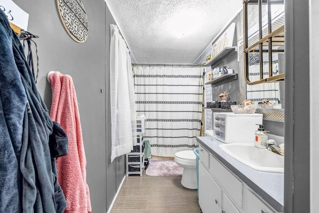 131 W Blue Branch Rd, Eatonton, GA 31024 - bathroom with a textured ceiling, curtained shower, and vanity