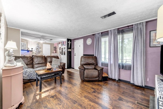131 W Blue Branch Rd, Eatonton, GA 31024 - living area with a textured ceiling, wood finished floors, and ceiling fan