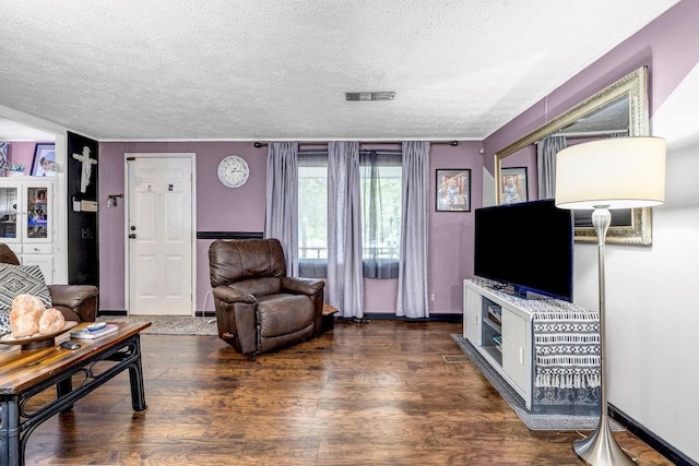 131 W Blue Branch Rd, Eatonton, GA 31024 - living area with a textured ceiling and wood finished floors