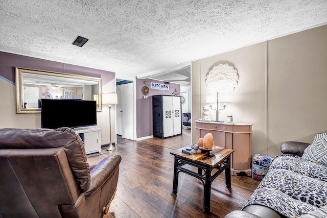 131 W Blue Branch Rd, Eatonton, GA 31024 - living room featuring wood finished floors and a textured ceiling