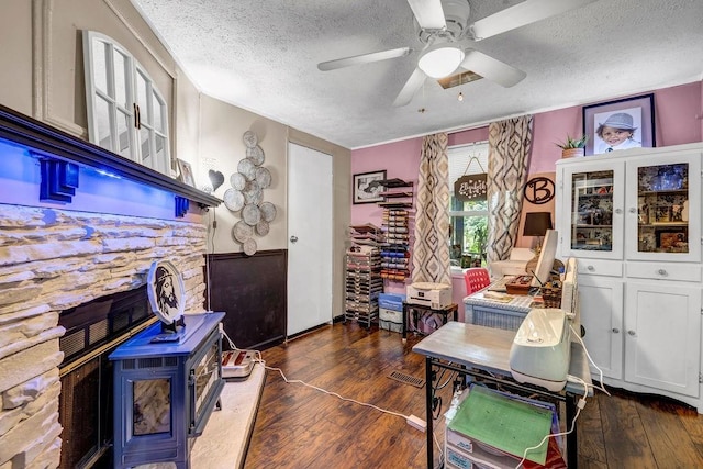 131 W Blue Branch Rd, Eatonton, GA 31024 - home office with a textured ceiling, wood-type flooring, and a ceiling fan