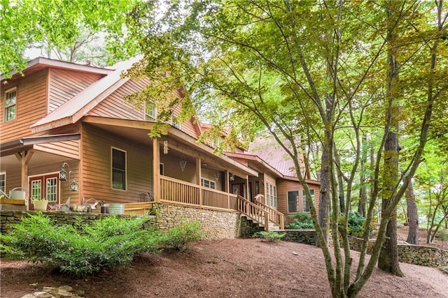 view of home's exterior with a porch