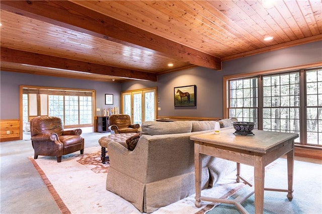 living room with beamed ceiling, wooden ceiling, and light colored carpet