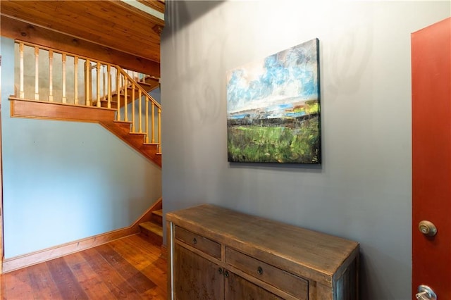 stairway featuring hardwood / wood-style flooring