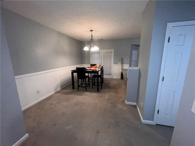 142 Benfield Cir, Cartersville, GA 30121 - carpeted dining area with a chandelier