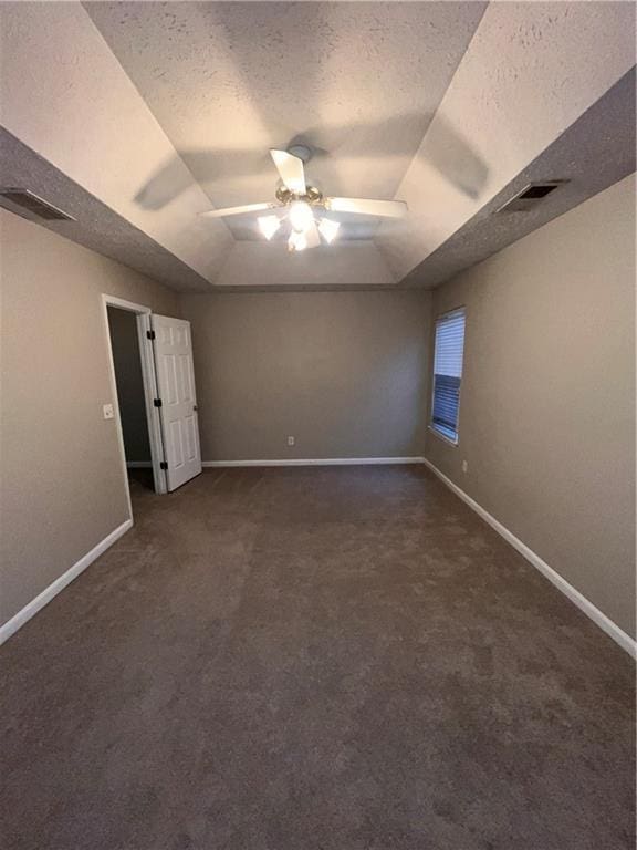 142 Benfield Cir, Cartersville, GA 30121 - carpeted empty room featuring ceiling fan, a textured ceiling, and a tray ceiling