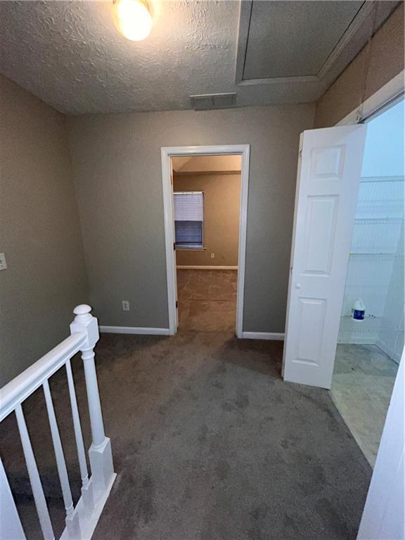 142 Benfield Cir, Cartersville, GA 30121 - carpeted spare room featuring a textured ceiling