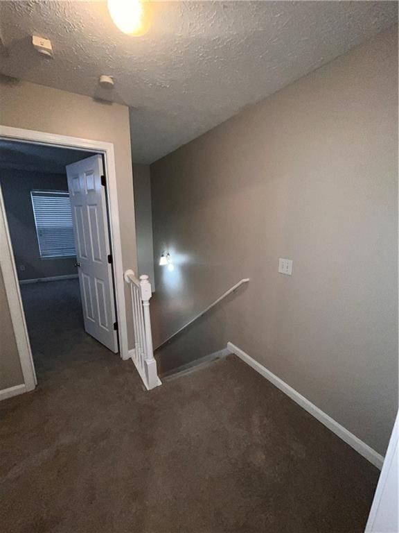 142 Benfield Cir, Cartersville, GA 30121 - staircase featuring carpet floors and a textured ceiling