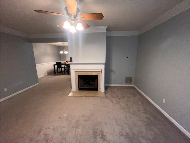 142 Benfield Cir, Cartersville, GA 30121 - unfurnished living room with carpet floors, ceiling fan with notable chandelier, and crown molding