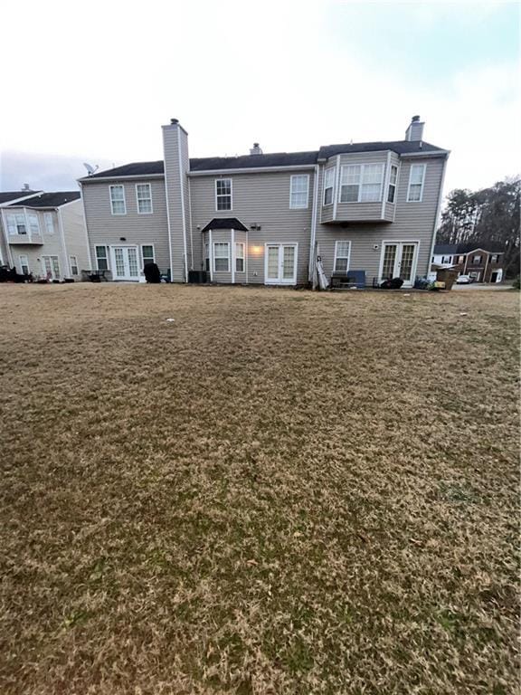 142 Benfield Cir, Cartersville, GA 30121 - rear view of property with a yard